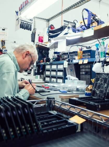 Man working on Clock Assembly